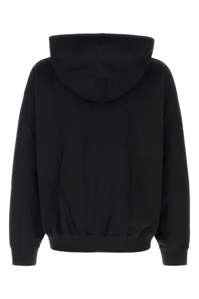 Y-3 Relaxed-fit Black Hoodie With Subtle Front Logo And Side Pockets In Black