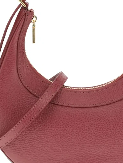Coccinelle Whisper Crescent Top-handle Shoulder Bag In Red
