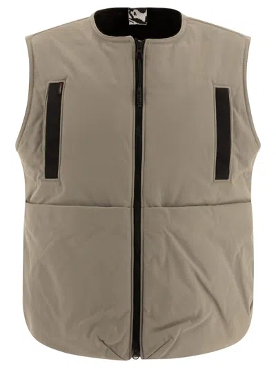 Gr10k High Collar Quilted Side Pockets Sleeveless Vest In Green