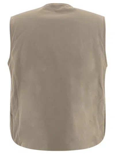 Gr10k High Collar Quilted Side Pockets Sleeveless Vest In Green
