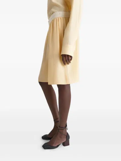 Lemaire Button-front Shorts In Yellow