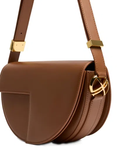 Patou Leather Shoulder Bag Adjustable Strap In Brown