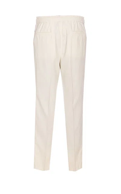 Brunello Cucinelli Men Leisure Fit Trousers In Ribbed Velvet With Drawstring And Double Pince In Neutral
