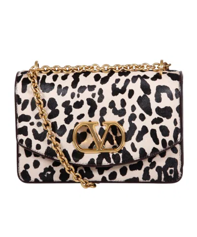Valentino Garavani Vain Small Cow-print Leather And Calf-hair Shoulder Bag In Multi