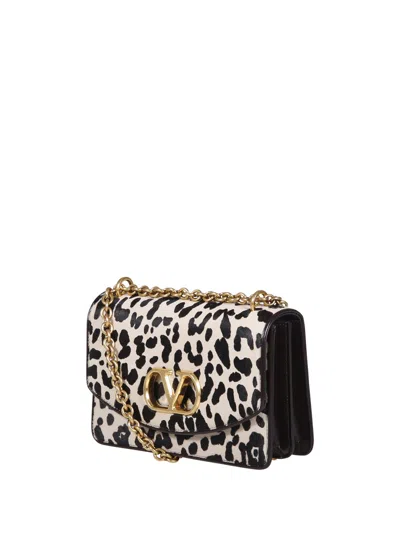 Valentino Garavani Vain Small Cow-print Leather And Calf-hair Shoulder Bag In Multi