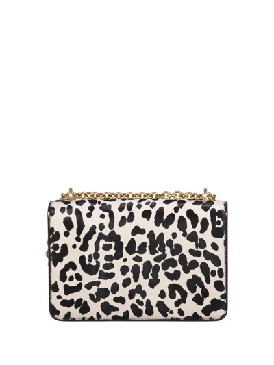Valentino Garavani Vain Small Cow-print Leather And Calf-hair Shoulder Bag In Multi