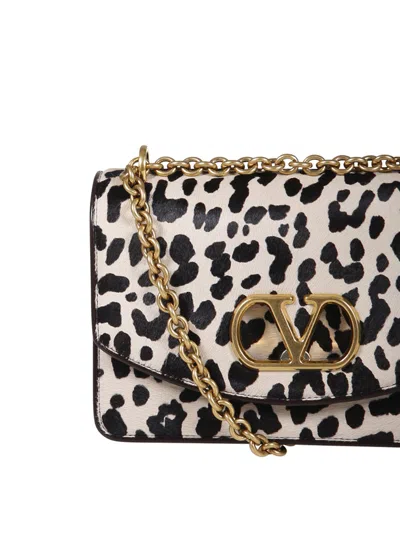 Valentino Garavani Vain Small Cow-print Leather And Calf-hair Shoulder Bag In Multi