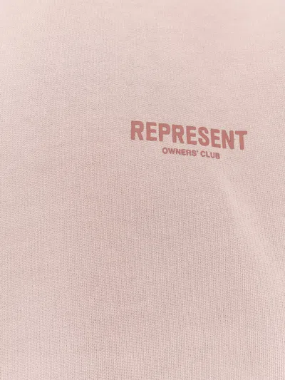 Represent Beige Oversized Hoodie With Snap-button Hood And Logo In Pink