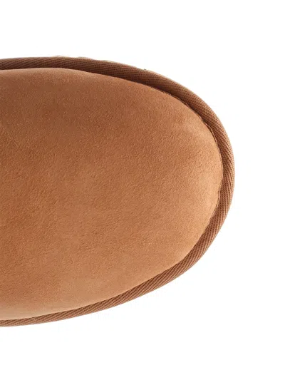 Ugg ® Classic Ultra Mini Shaggy Water Resistant Boot In Brown