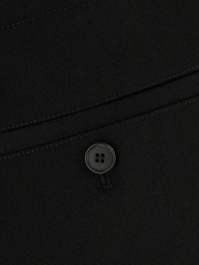 Givenchy Wool Trousers With Pleated Design And Button Detail In Black