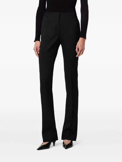 Versace Flared-leg Trousers In Black