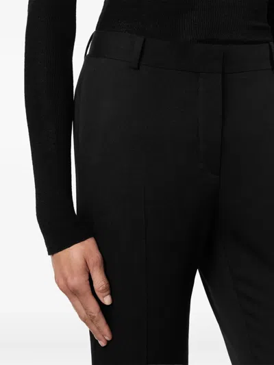 Versace Flared-leg Trousers In Black