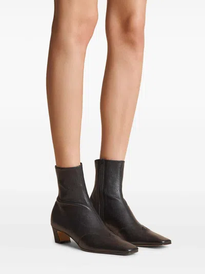 Khaite Nevada Stretch Leather Ankle Booties In Black