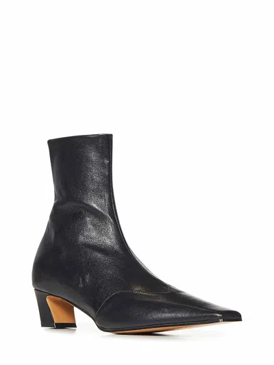Khaite Nevada Stretch Leather Ankle Booties In Black