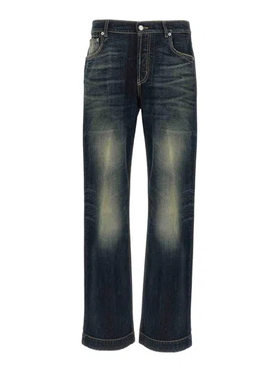 Alexander Mcqueen Wide Leg Faded Jeans In Black