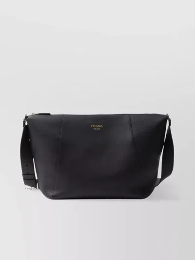 Prada Logo Print Leather Messenger Bag In Black