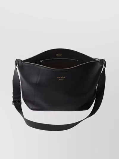 Prada Logo Print Leather Messenger Bag In Black