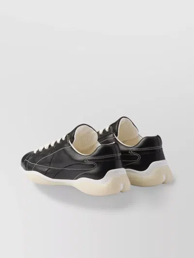 Prada Handcrafted Leather Sneakers Geometric Stitching In Black