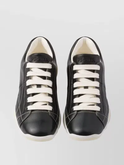Prada Handcrafted Leather Sneakers Geometric Stitching In Black