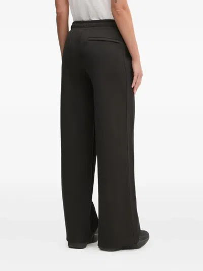 Puma Embroidered-logo Track Pants In Black