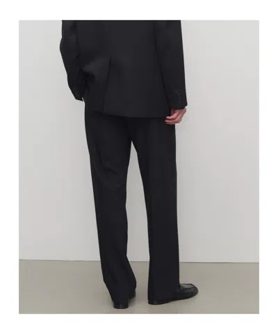 The Row Tailored Wool Zev Trousers Pleated Front In Black