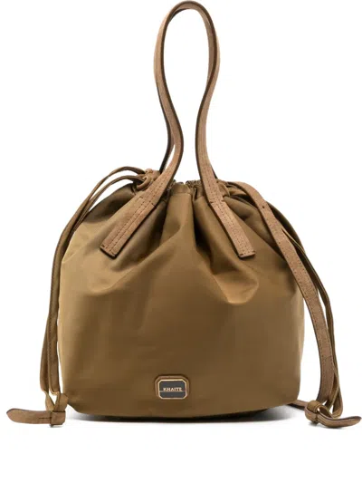 Khaite Rory Suede-trimmed Shell Bucket Bag In Green