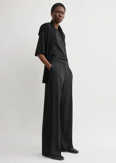 Totême Wide Fluid Trousers Black In Blue