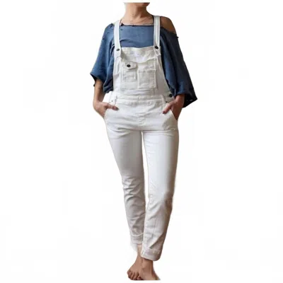 Free People Washed Denim Stretch Skinny Cropped Overalls In White In White