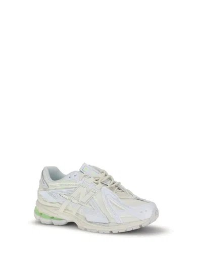 New Balance Low Top Sneakers With Mesh Panels And Reflective Accents In Multi