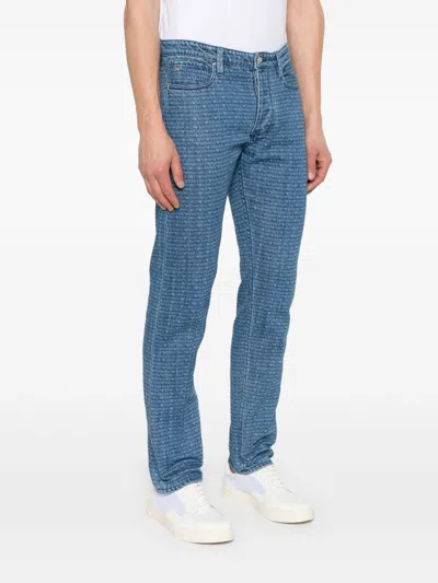 Emporio Armani Allover Logo Denim Jeans In Black