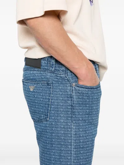 Emporio Armani Allover Logo Denim Jeans In Black