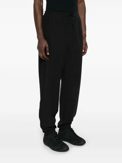 Emporio Armani Logo Print Textured Fabric Sweatpants In Black