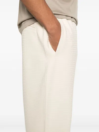 Emporio Armani Allover Logo Sweatpants In Neutral