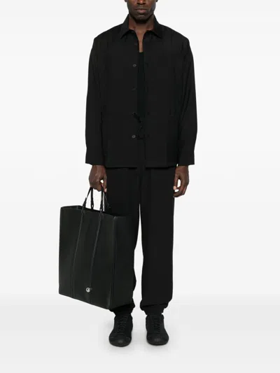 Emporio Armani Logo Print Textured Fabric Sweatpants In Black