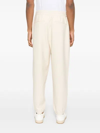 Emporio Armani Allover Logo Sweatpants In Neutral