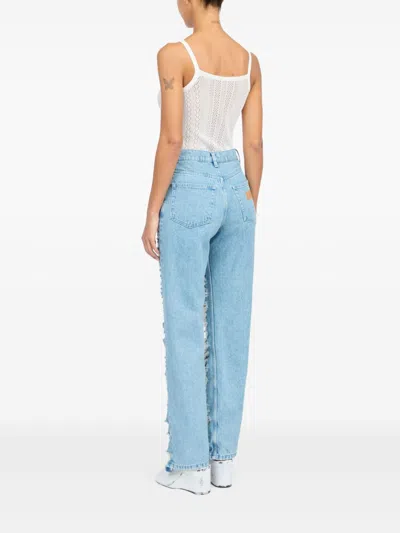 Mm6 Maison Margiela Mm6 By Maison Margiela Distressed Light Blue Jeans With Signature Numbers Motif In Blue