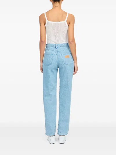 Mm6 Maison Margiela Mm6 By Maison Margiela Distressed Light Blue Jeans With Signature Numbers Motif In Blue