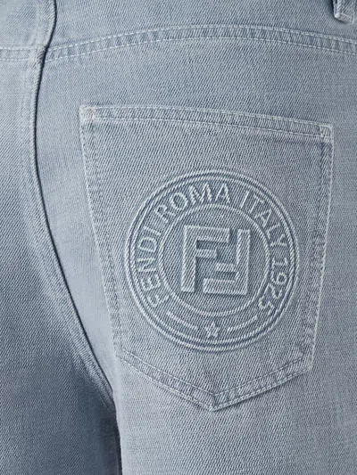 Fendi Embossed Logo Slim Jeans In Blue
