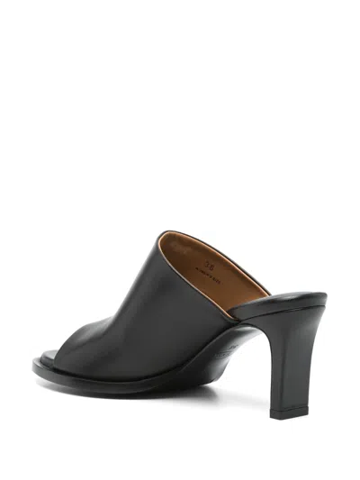 Tod's Mules In Leather In Black