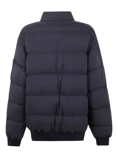 Stone Island Quilted Down Jacket With Ribbed Cuffs And Signature Patch In Blue