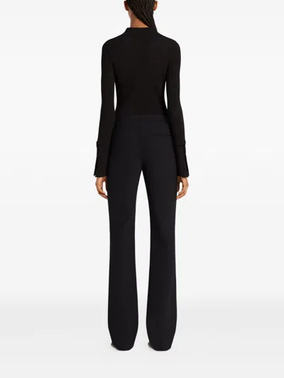 Courrèges Fitted Ribbed Long-sleeve Top With Unique Collar In Black