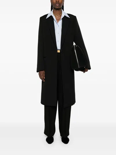 Totême Tailored Single-breasted Coat With Notched Lapels In Black