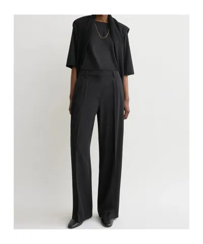 Totême Pleated Wool Wide-leg Trousers In Black