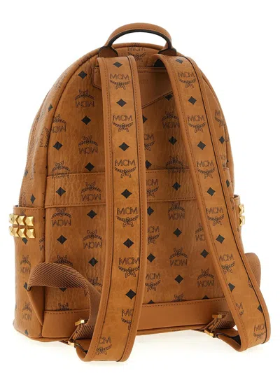 Mcm Small Medium Backpack With Front Pocket And Straps In Brown