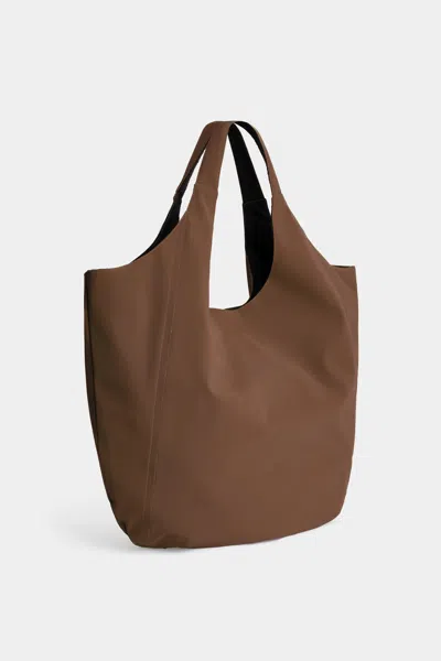 Stutterheim Svea Puffer Bag Matte In Brown