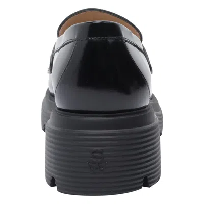 Stuart Weitzman Round Toe Chunky Sole Glossy Loafers In Black