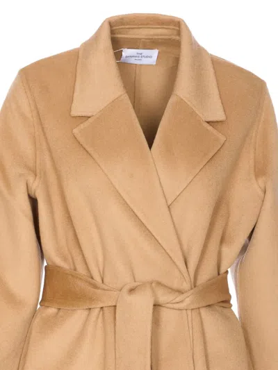 The Dynamis Studio Belted Double-breasted Coat In Gold