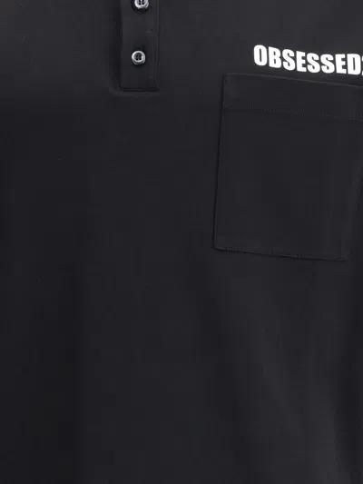Dsquared2 Black Polo Shirt With Classic Collar And Logo Lettering On The Front In Black