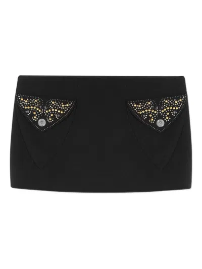 Versace Chic Fitted Mini Skirt With Embellished Pockets In Black