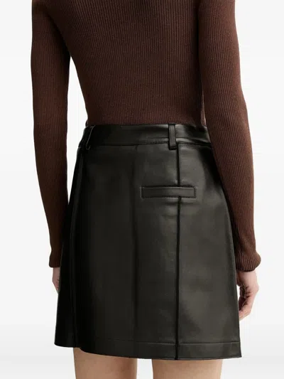 Aeron Button-fastening Leather Mini Skirt In Black